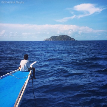 The best seat on the boat... on the way to Apo Island for a day of diving